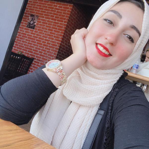 Dina M . Ezz