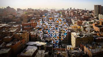 eL Seed: A project of peace, painted across 50 buildings